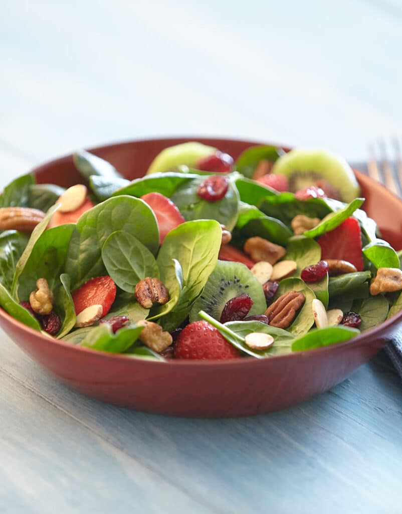 closeup of salad with nuts and fruits